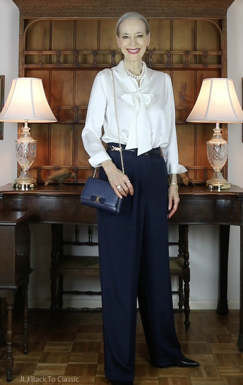 timeless fashion classic silk bow blouse, navy silk trousers, ferragamo vara bow bag