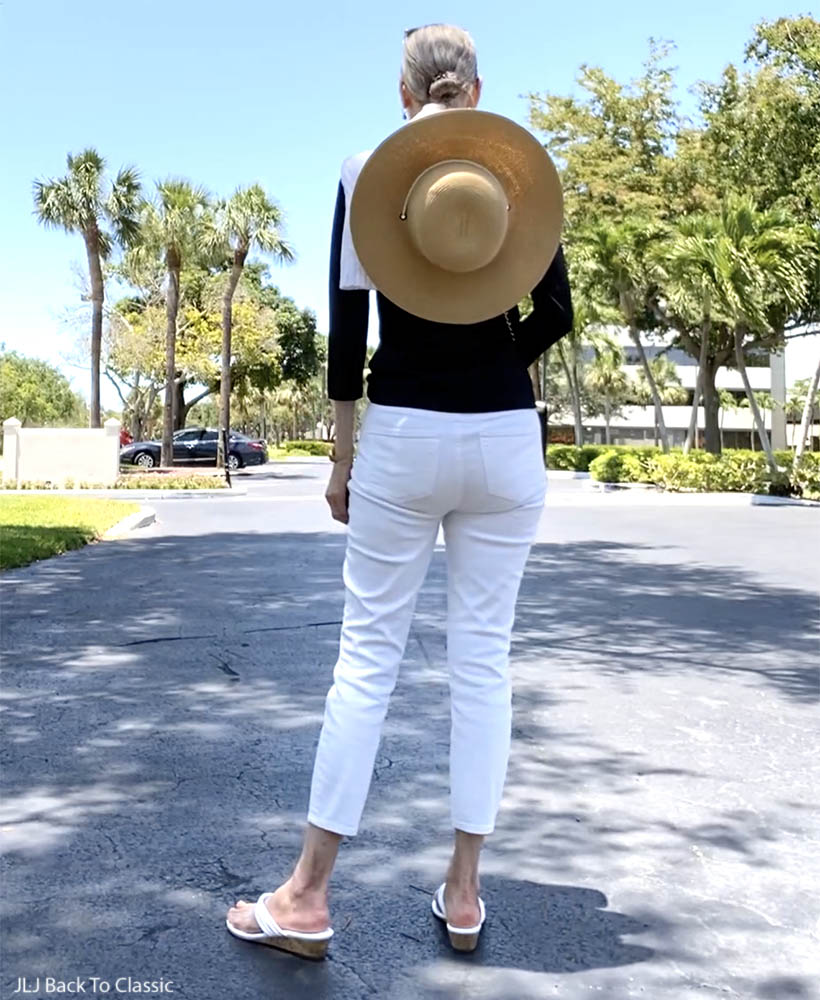 classic style over 50 chanel jumbo, black ruffle top, white jeans ootd 3