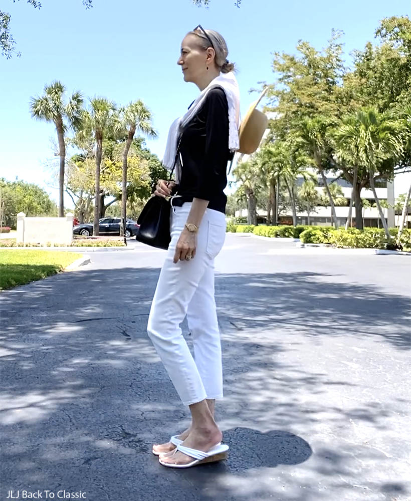 classic style over 50 chanel jumbo, black ruffle top, white jeans ootd 5