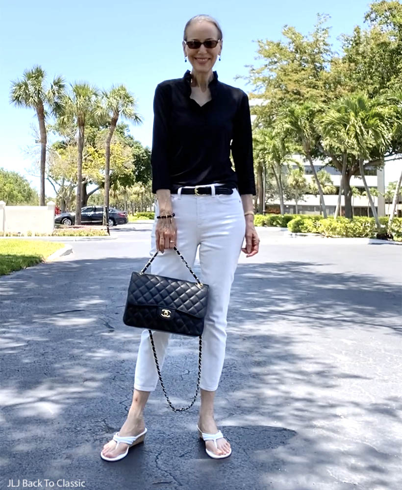 classic style over 50 chanel jumbo, black ruffle top, white jeans ootd 6
