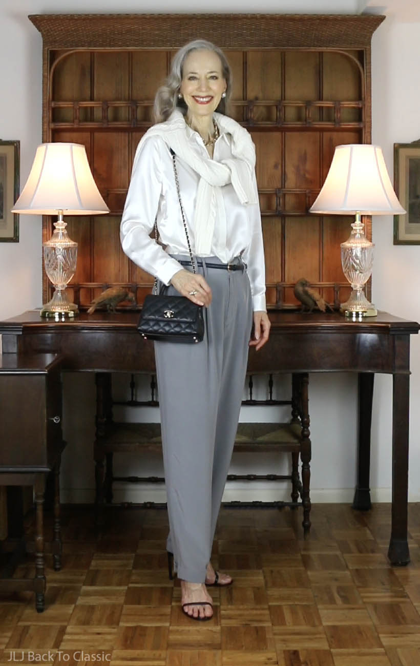 lilysilk white silk blouse, white merino wool cable sweater, grey pleated trousers 6
