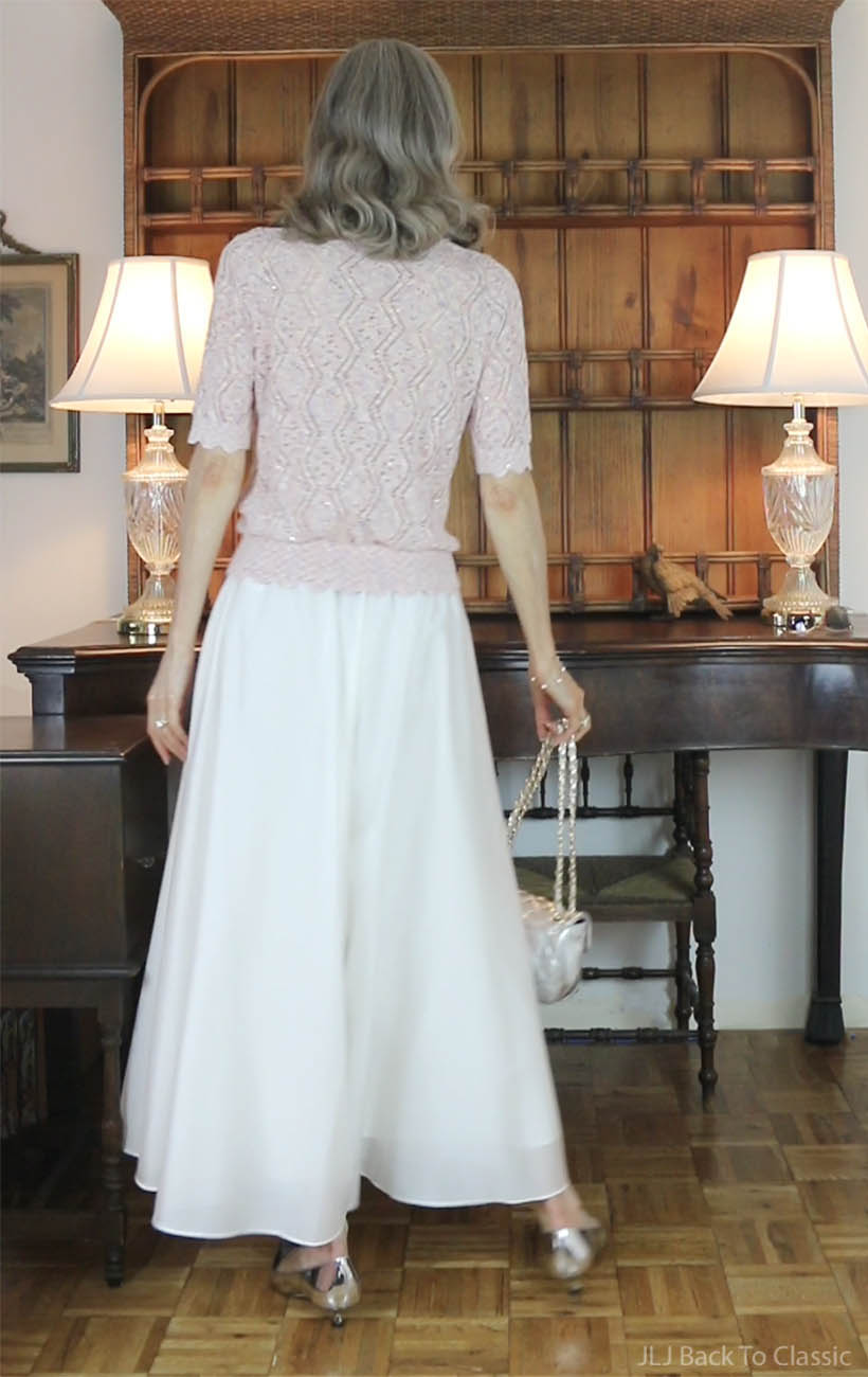 classic-fashion-60plus-influencer-janis-lyn-johnson-white-palazzo-pants-pink-sweater-4