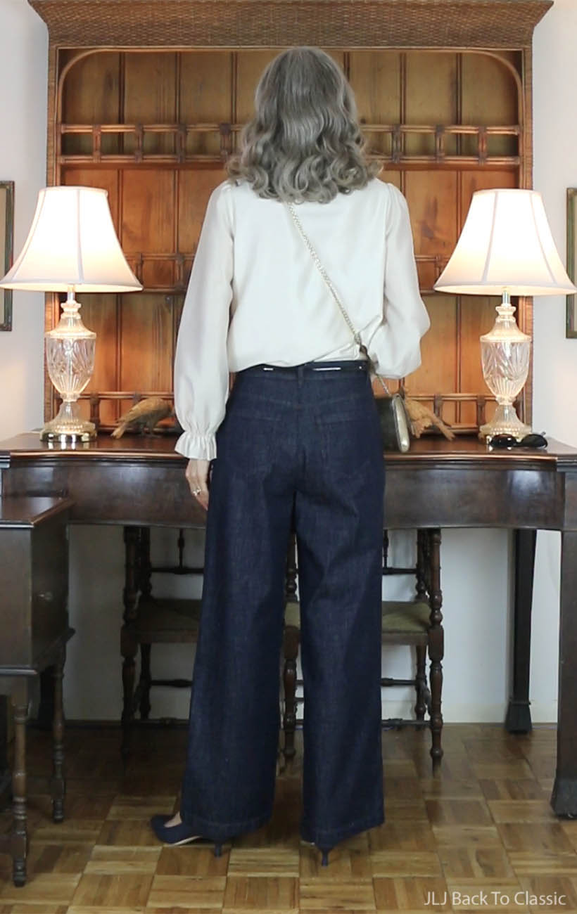 ferragamo-gold-vara-bow-bag-dark-wash-jeans-ivory-ruffle-blouse-4