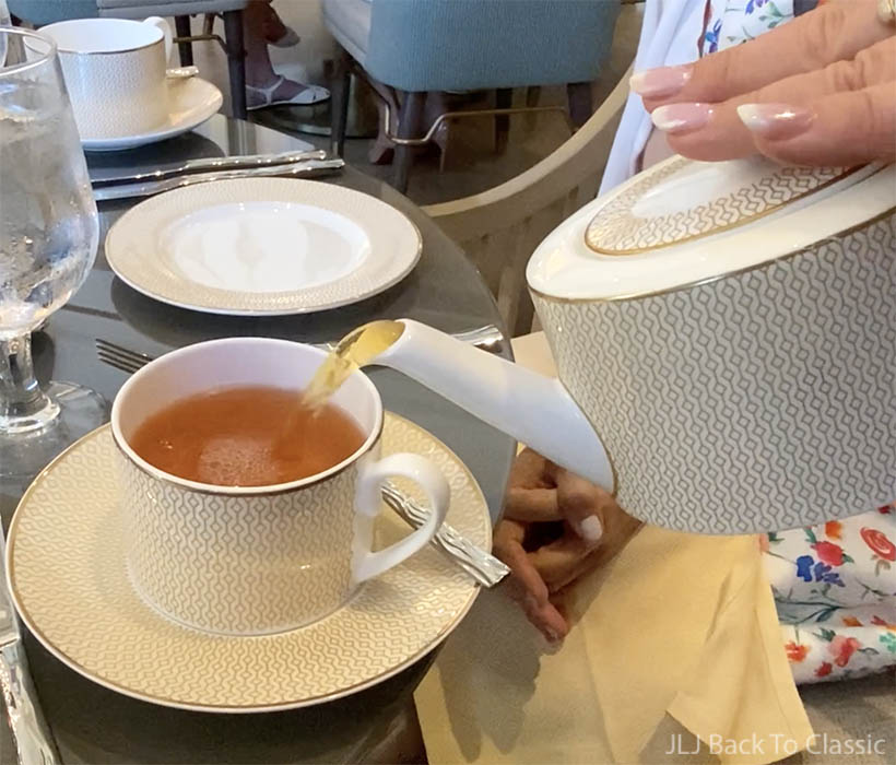 tea-being-poured-at-afternoon-tea-ritz-naples-jljbacktoclassic