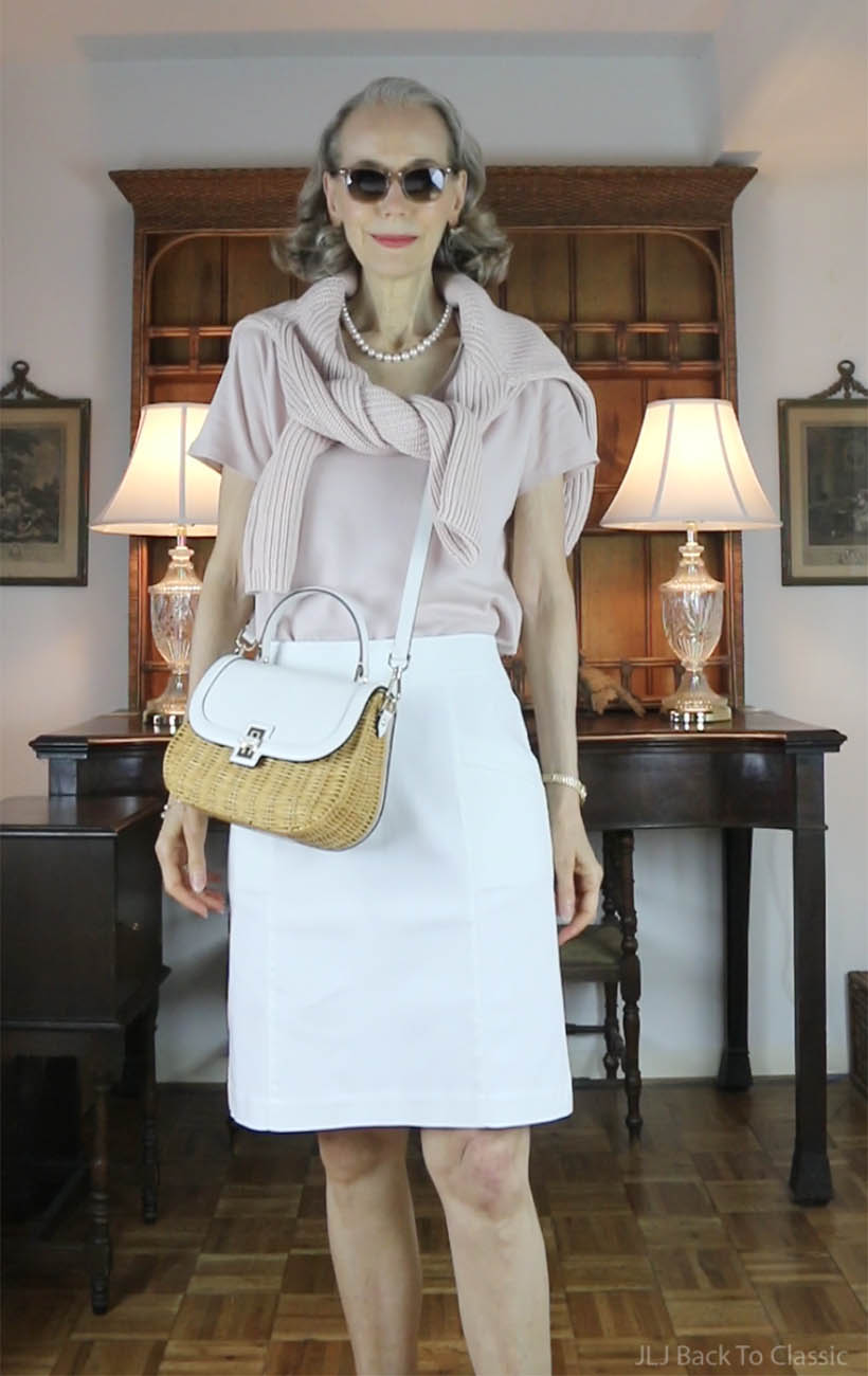 classic-style-quince-pink-tee-pink-fisherman-sweater-white-skirt-wicker-bag-2