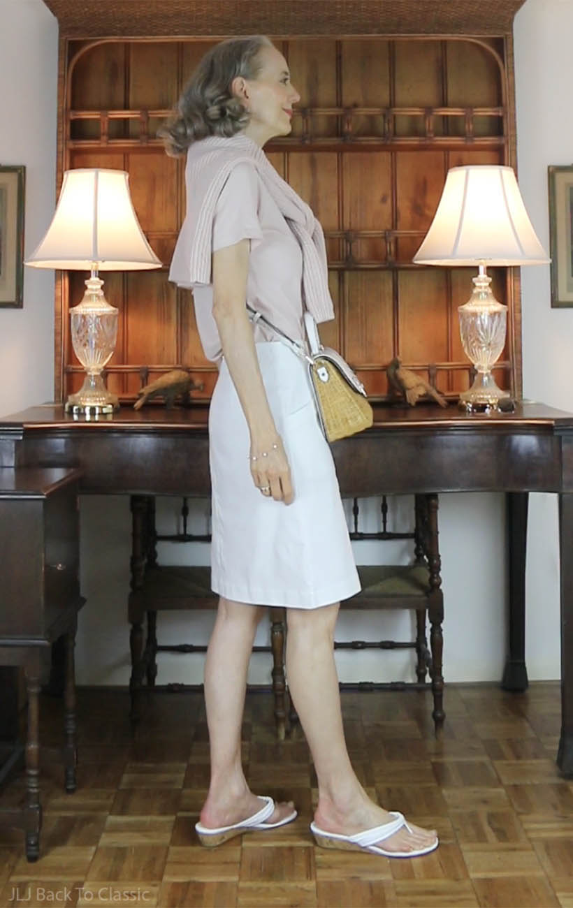 classic-style-quince-pink-tee-pink-fisherman-sweater-white-skirt-wicker-bag-4
