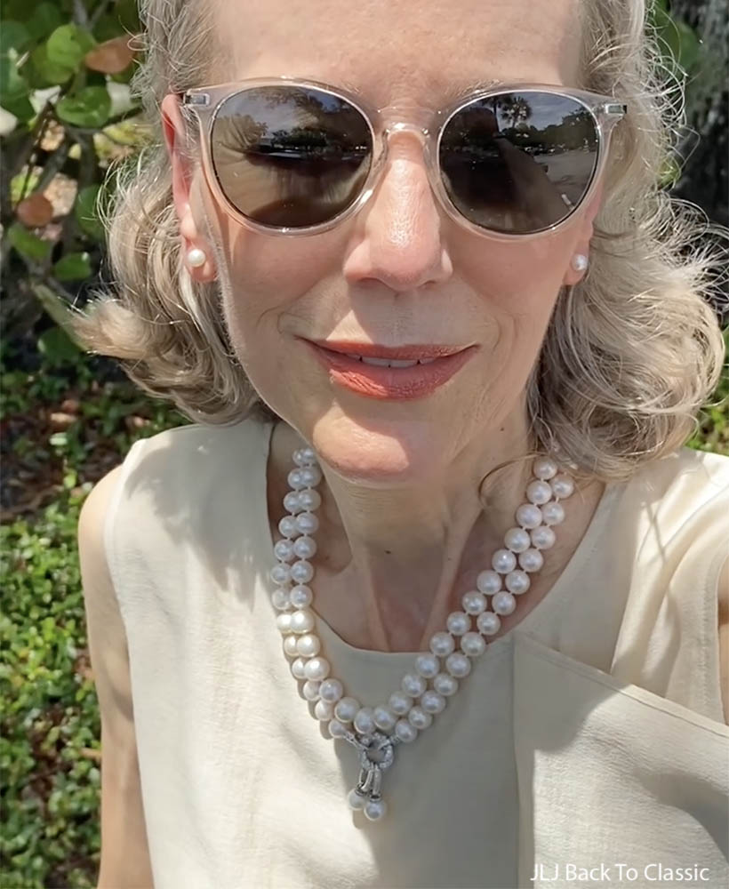 timeless-pearl-jewelry-transparent-frame-sunglasses-on-florida-granfluencer-janis-lyn-johnson